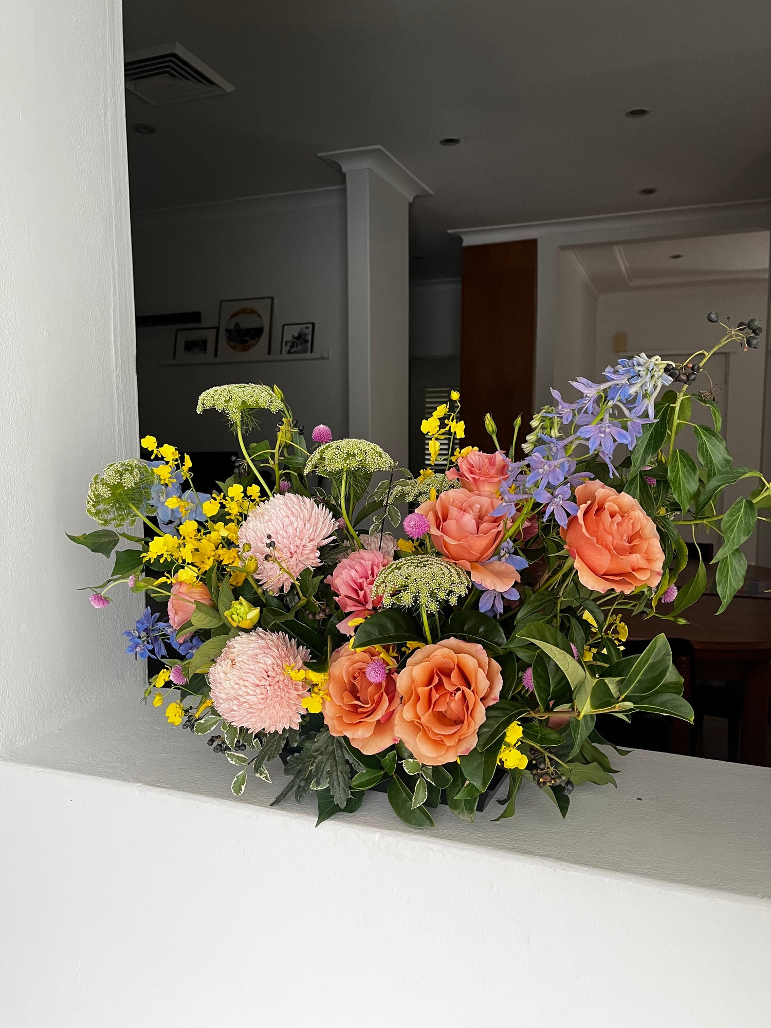A flower arrangement with colourful blooms